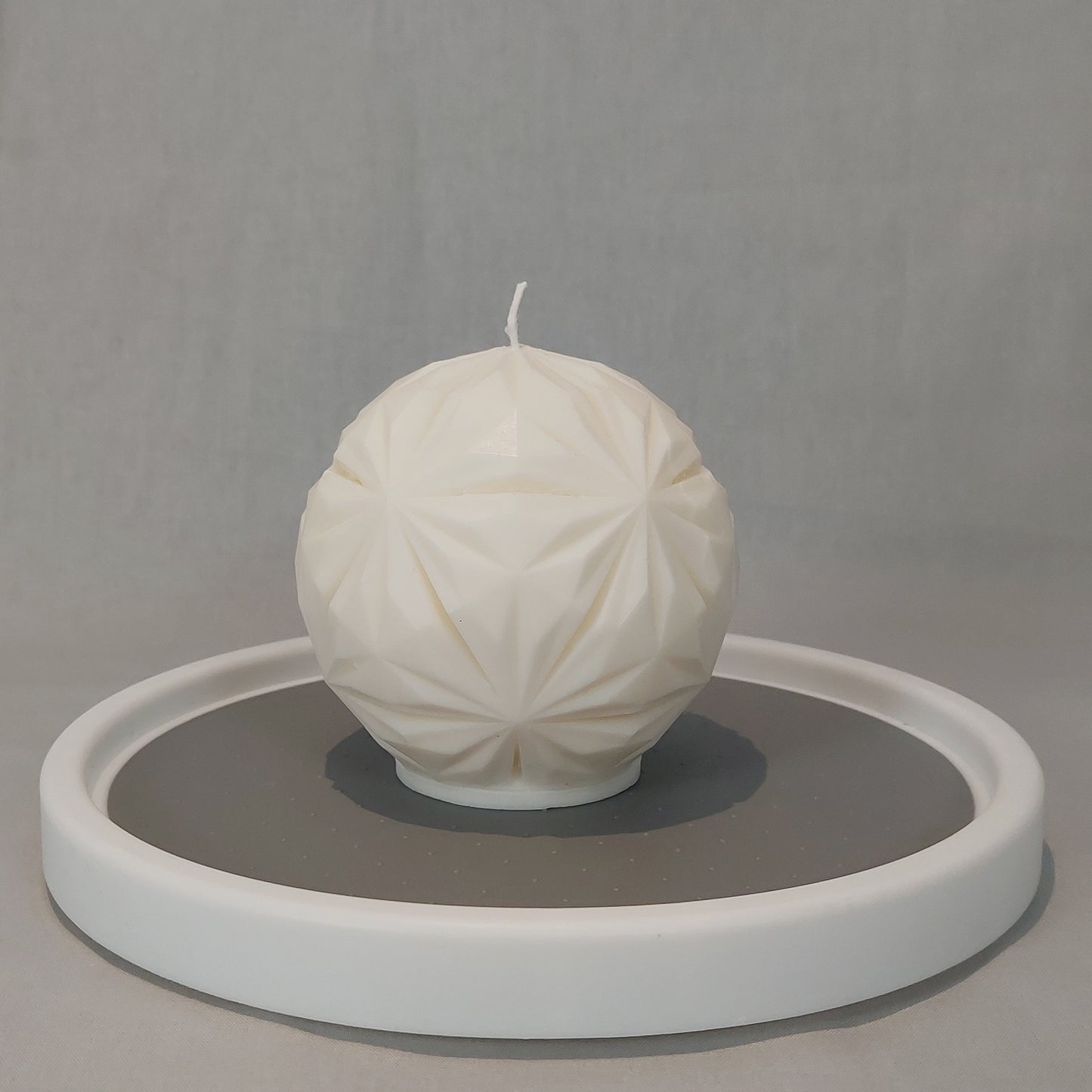 White star candle scented at side view