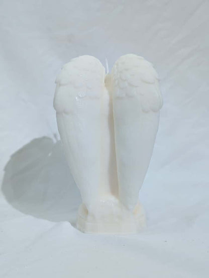 White angel wings on a white background