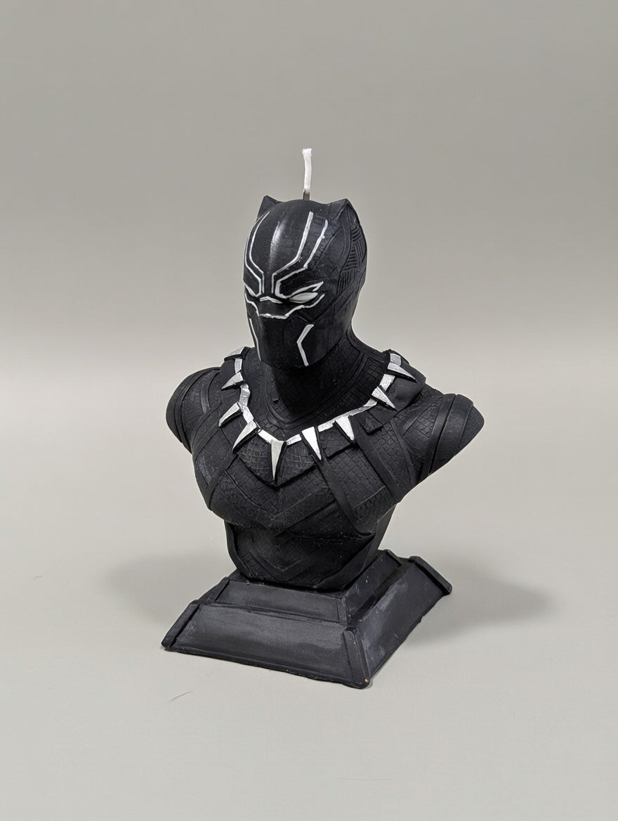 Black Panther bust candle on a gray background