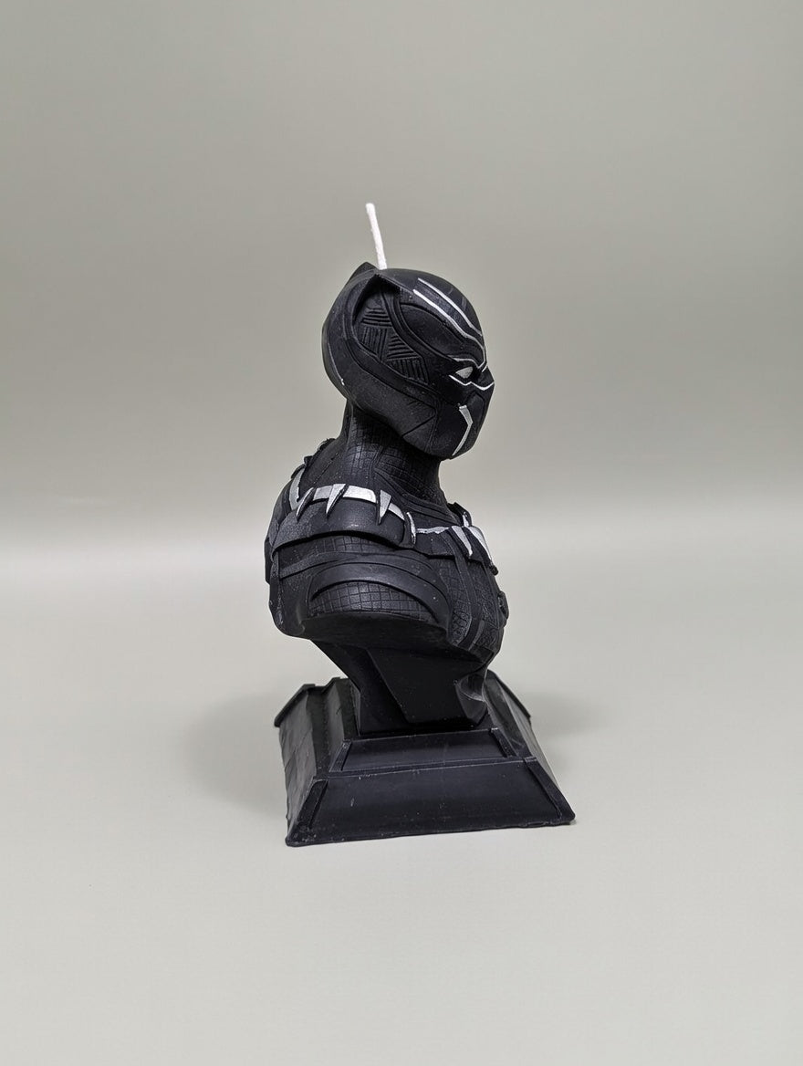 Black Panther bust candle on a gray background