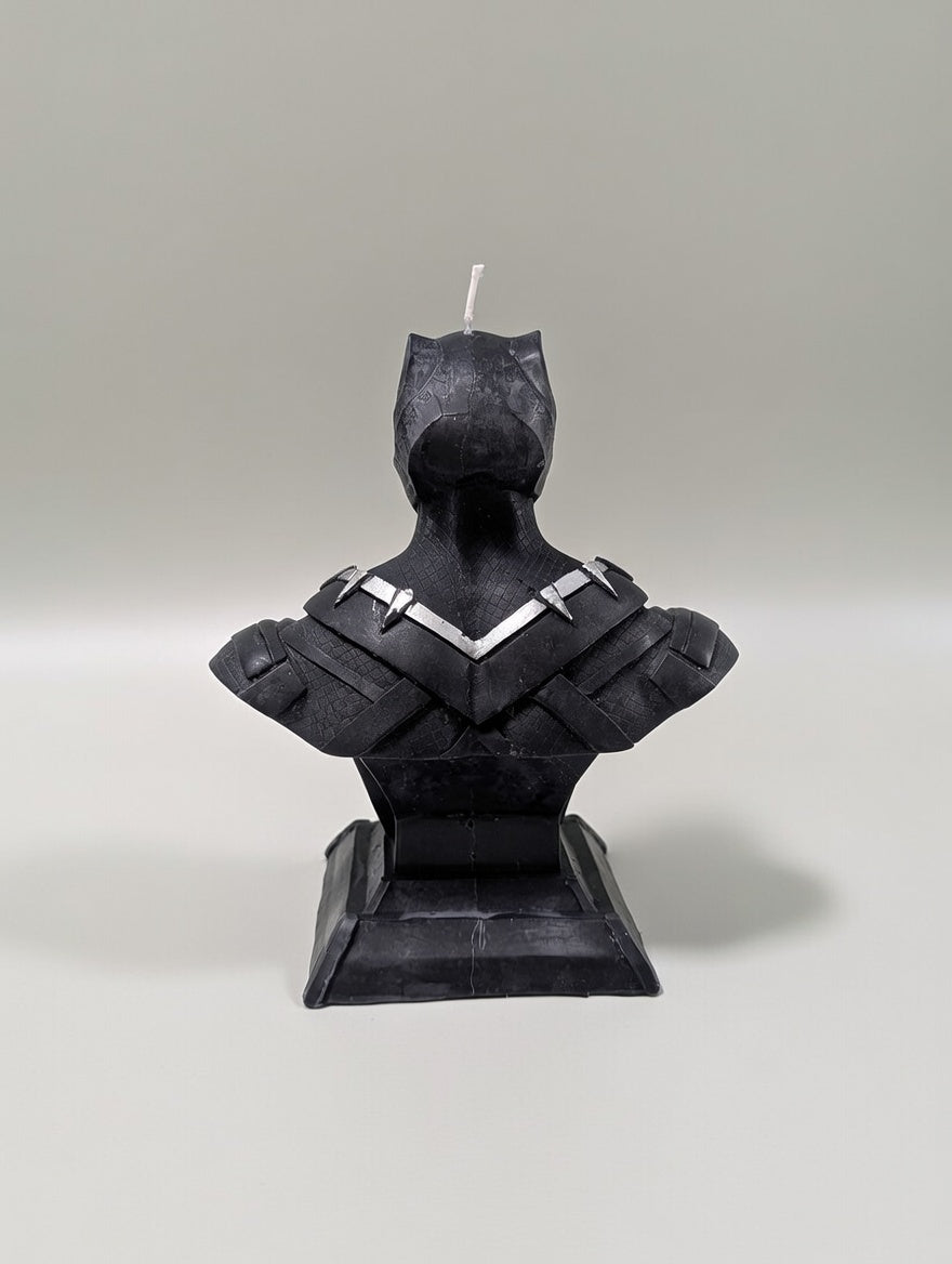 Black Panther bust candle on a gray background