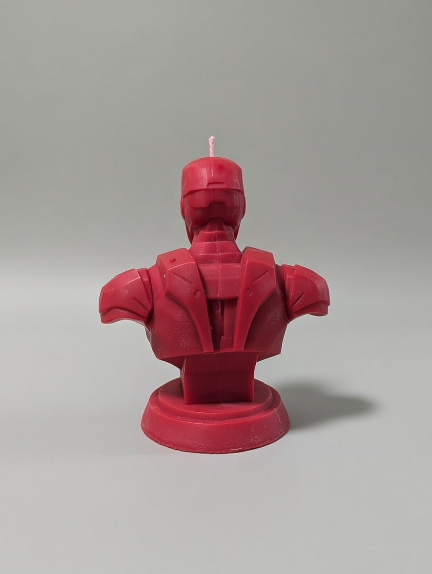 Red robot bust candle on a gray background