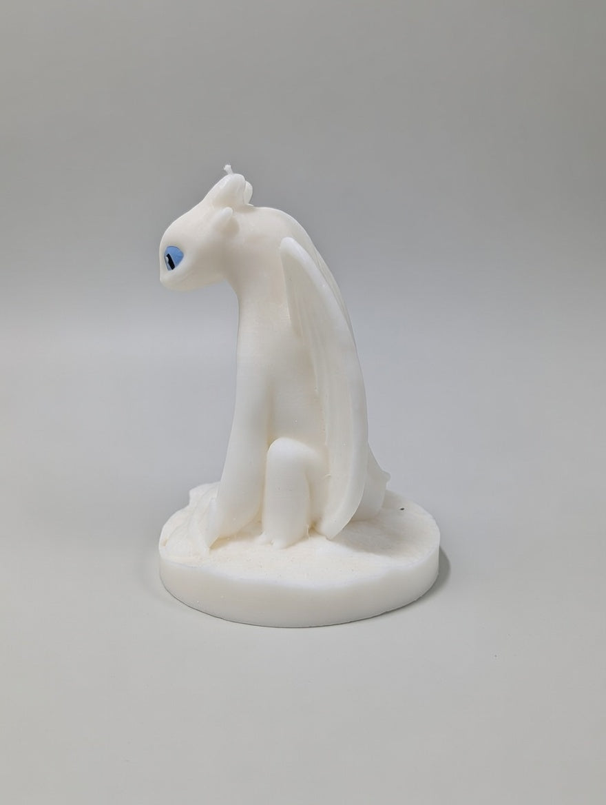 Light Fury Candle candle on a light grey background