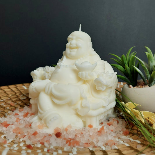 Laughing Buddha  Candle sitting on pink sale 